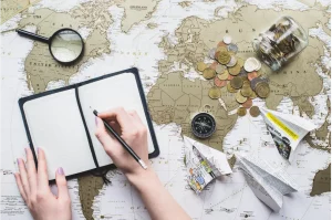 Global logistics mapping displaying trade routes compass and coins for FCA Incoterm compliance analysis